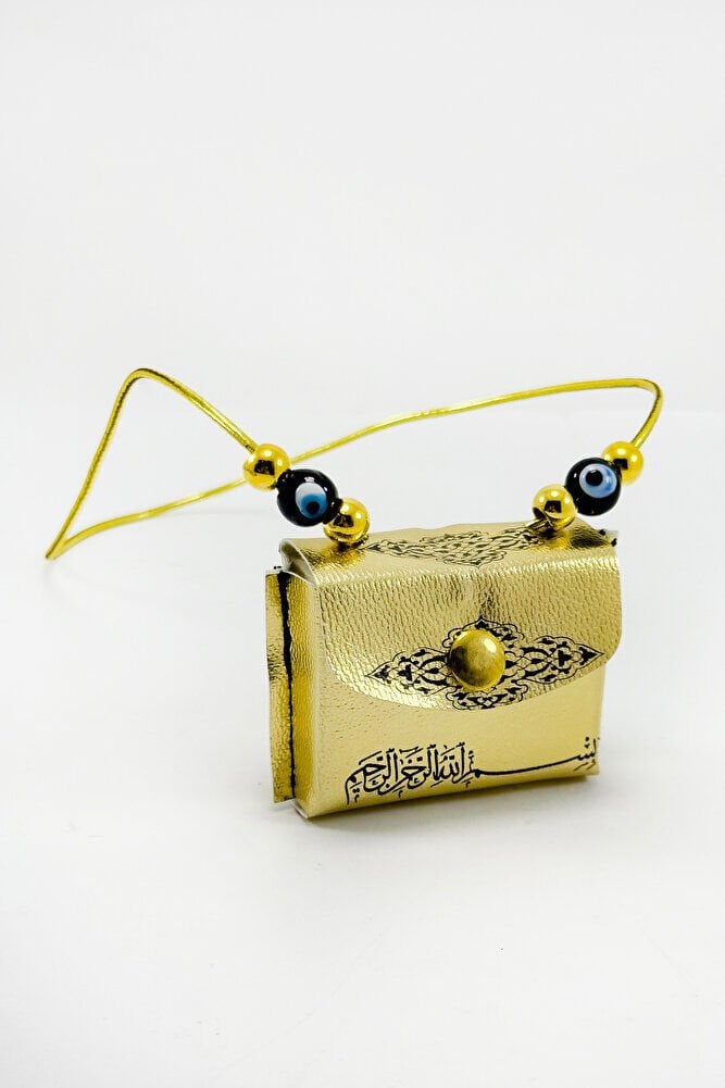 Altın Renkli El Yapımı Siyah Cam Nazarlı Deri Çantalı Mini Kur'an-ı Kerim Lastikli Oto Ayna Süsü
