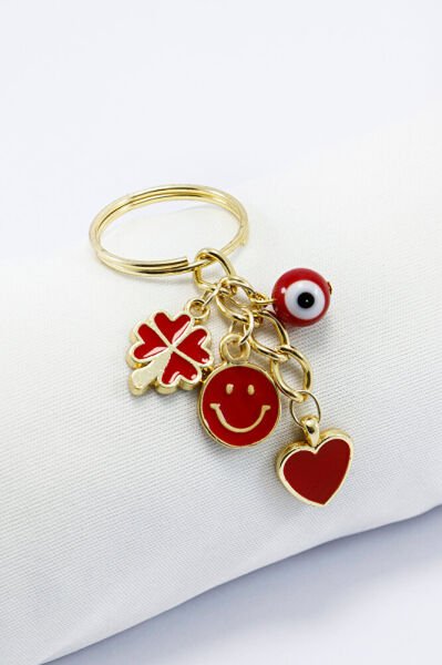 Kırmızı Cam Nazar Boncuğu Yonca Gülen Yüz Gold Renkli Küçük Metal Anahtarlık