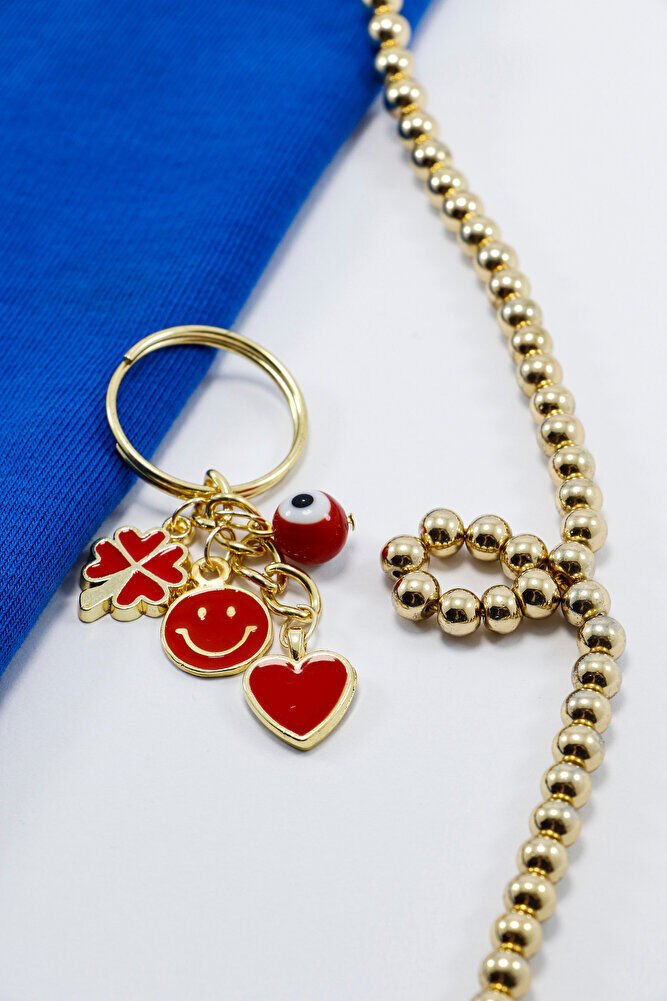 Kırmızı Cam Nazar Boncuğu Yonca Gülen Yüz Gold Renkli Küçük Metal Anahtarlık