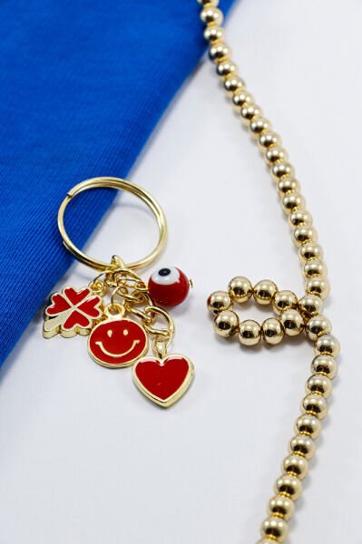 Kırmızı Cam Nazar Boncuğu Yonca Gülen Yüz Gold Renkli Küçük Metal Anahtarlık